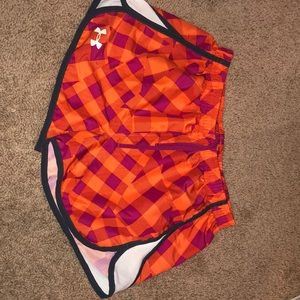 Orange and pink under armor shorts
